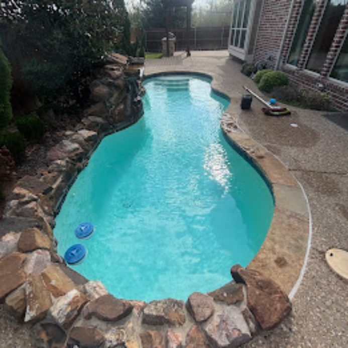 Pool technician testing water quality